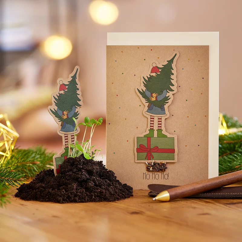 Weihnachtskarte "Mädchen mit Tannenbaum"